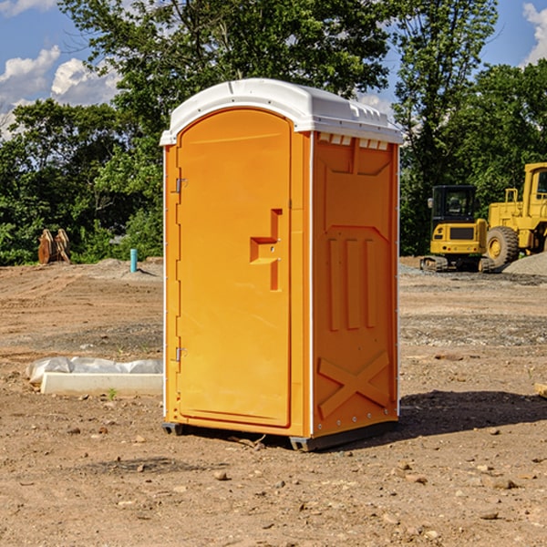 how often are the portable restrooms cleaned and serviced during a rental period in Landess